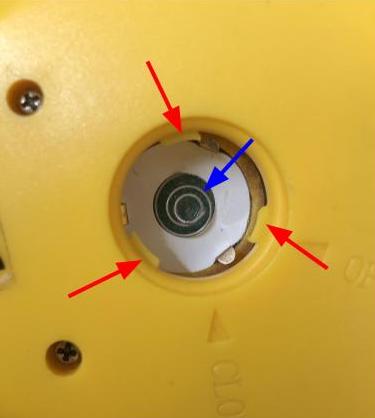 back_of_stopwatch_with_arrows.jpg